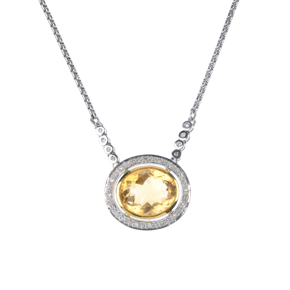 An 18ct gold citrine and diamond cluster necklace. The oval-shape citrine collet, within a single-