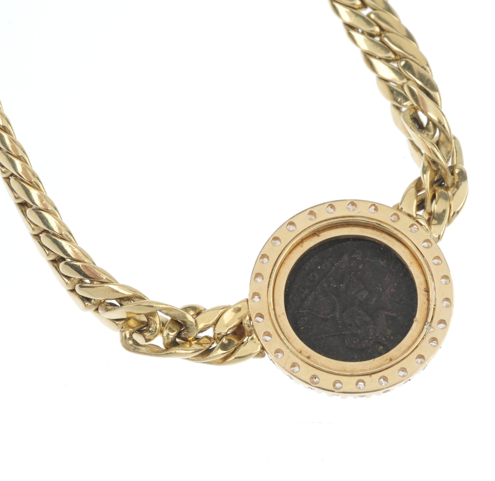 A 'coin' and diamond necklace. The coin-medallion, within a brilliant-cut diamond surround, to the - Image 3 of 4