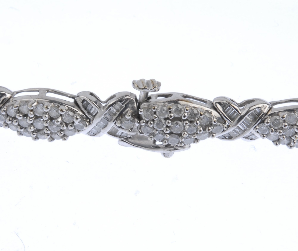 (539726-2-A) A 9ct gold diamond bracelet. Designed as a series of pave-set diamond marquise-shape - Image 4 of 4