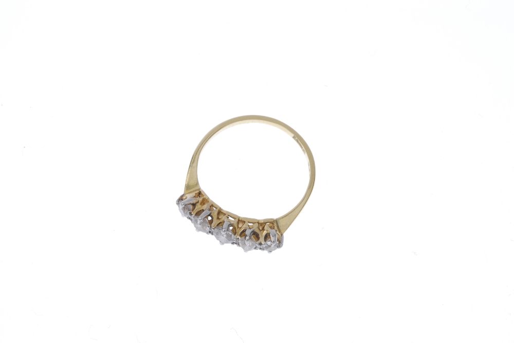 A mid 20th century 18ct gold diamond five-stone ring. The slightly graduated old-cut diamond line, - Image 2 of 4