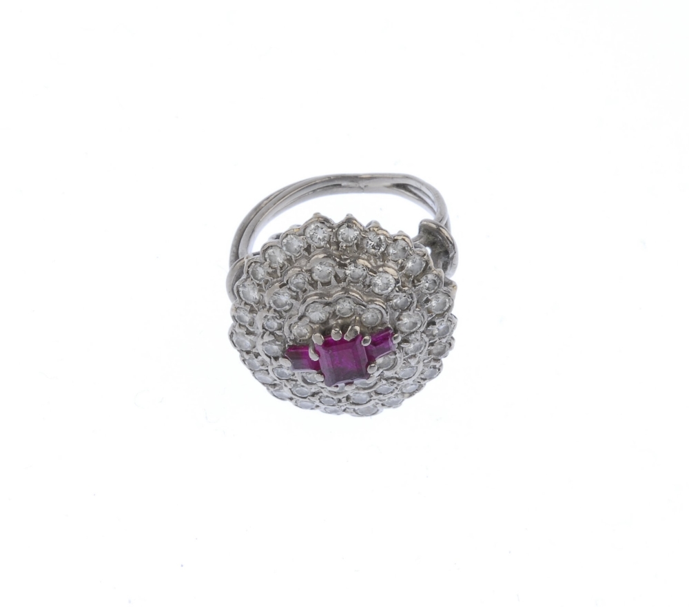 (546519-2-A) A diamond and gem-set dress ring. The three graduated rectangular-shape red gems, - Image 2 of 4