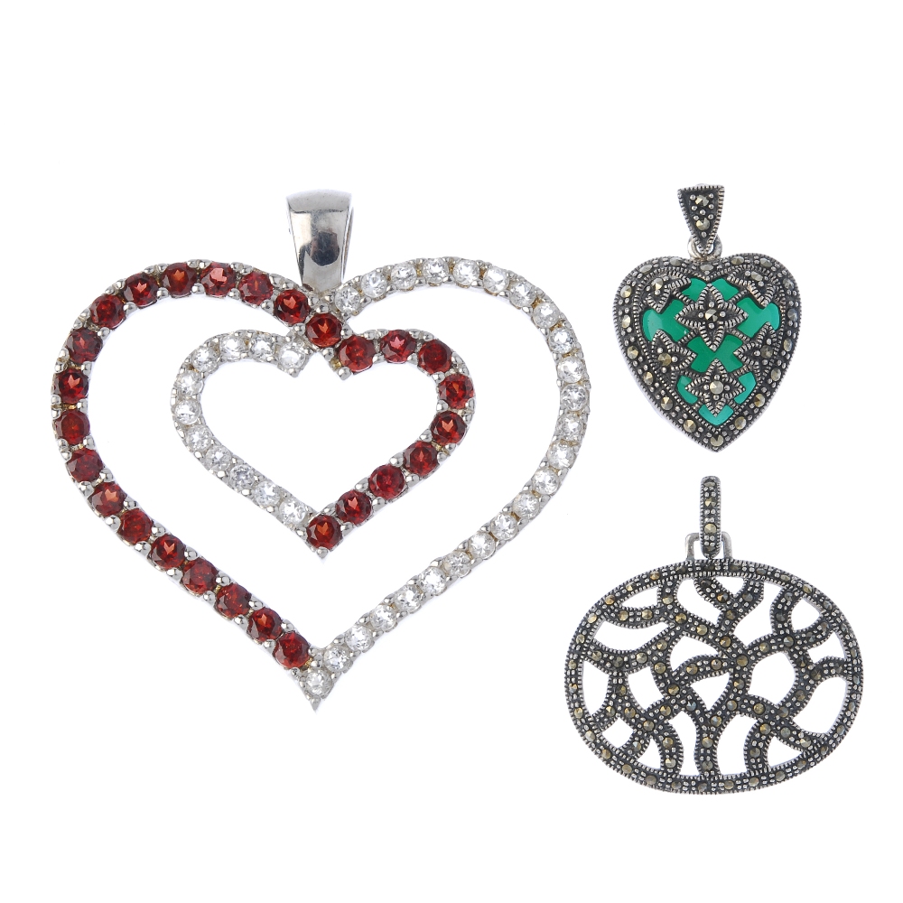 A quantity of gem-set silver and white metal jewellery. To include a pendant designed as two