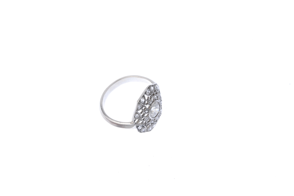 A diamond cluster ring. Of openwork design, the brilliant-cut diamond collet, within a single-cut - Image 3 of 4