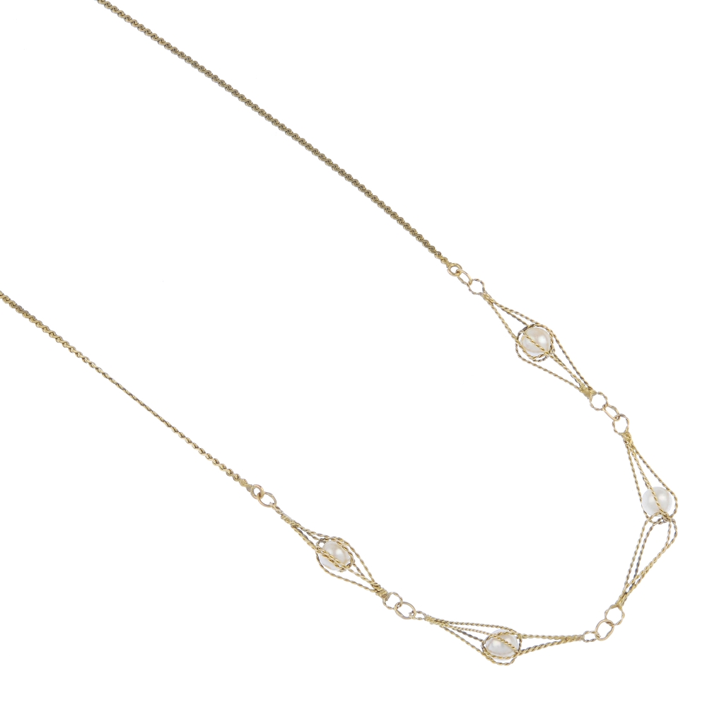 A 9ct gold cultured pearl necklace. Designed as a series of four cultured pearls, each within a