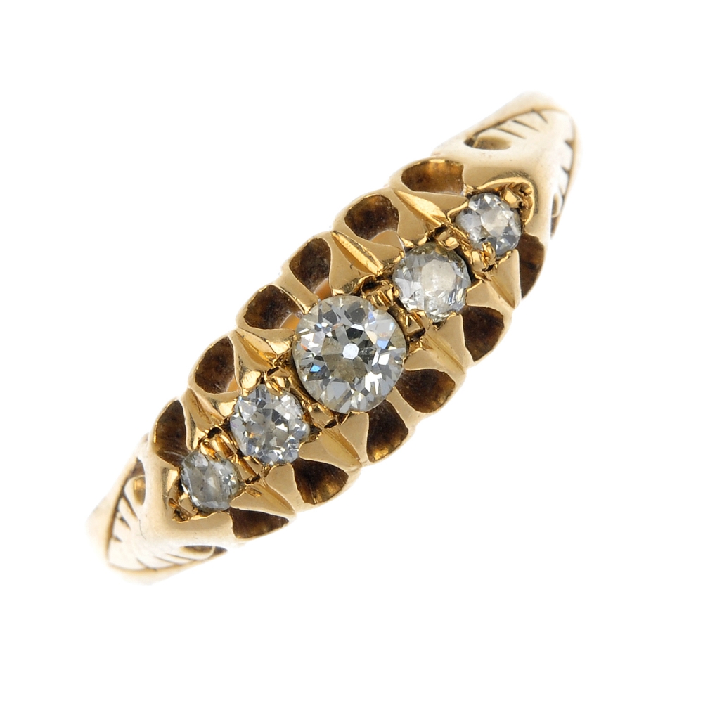 A late 19th century 18ct gold diamond five-stone ring. The slightly graduated old-cut diamonds,