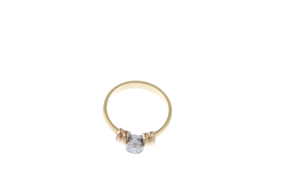 An 18ct gold diamond single-stone ring. The brilliant-cut diamond collet, to the curved double-bar - Image 2 of 4