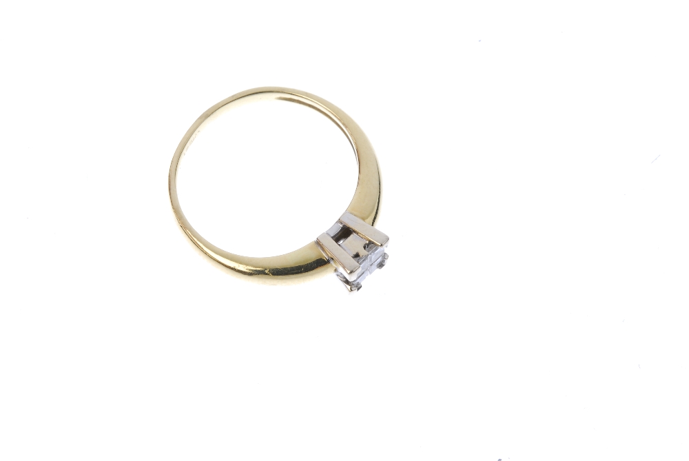 An 18ct gold diamond four-stone ring. The four square-shape diamonds, to the tapered band. Estimated - Image 3 of 4