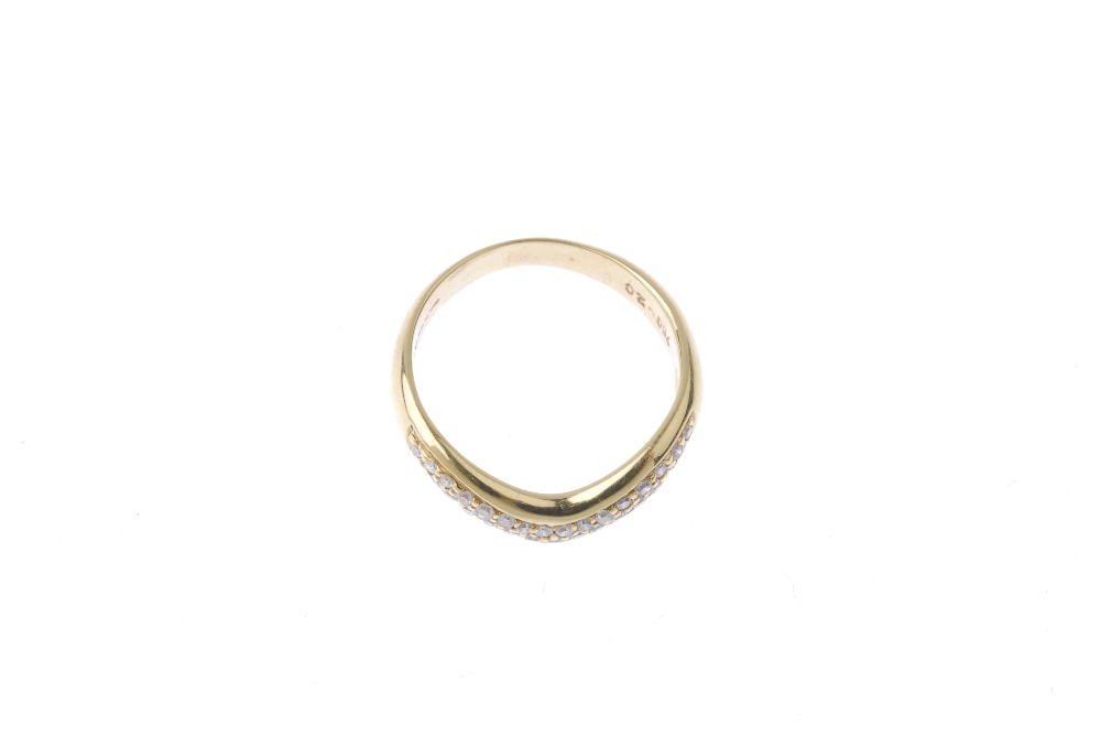 An 18ct gold diamond dress ring. The pave-set diamond chevron, to the plain half-band. Total diamond - Image 2 of 3