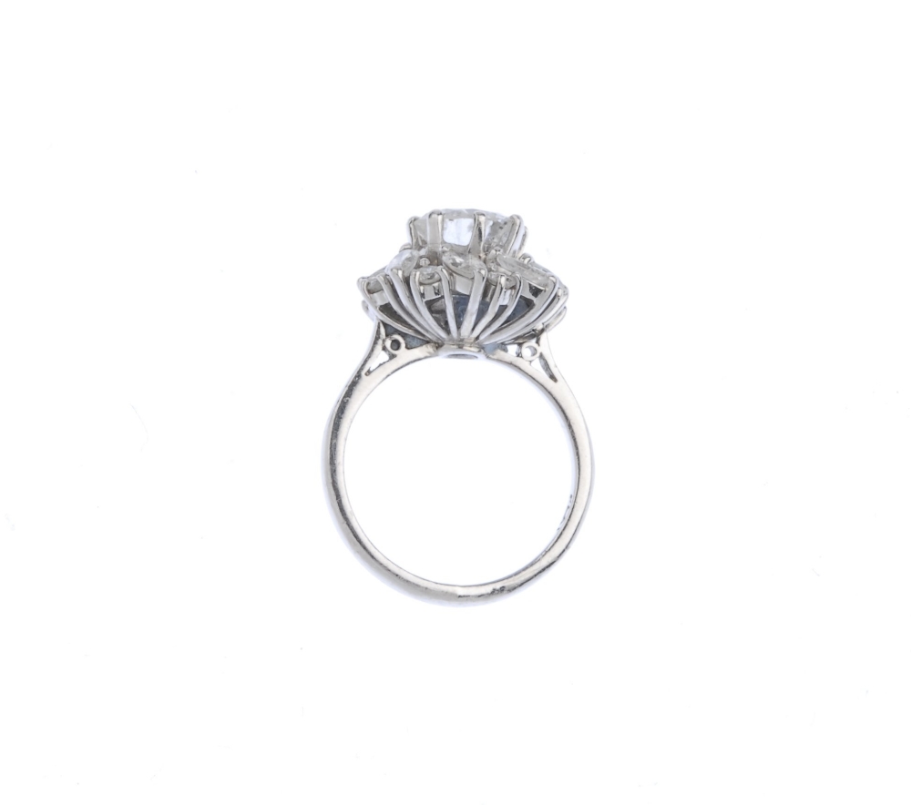 (540651-1-A) A diamond cluster ring. The brilliant-cut diamond, within a marquise and brilliant- - Image 2 of 3