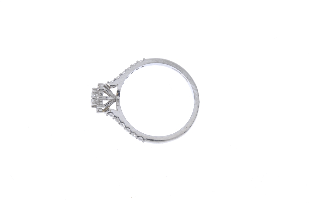 A platinum diamond cluster ring. The brilliant-cut diamond, with similarly-cut diamond surround - Image 3 of 4