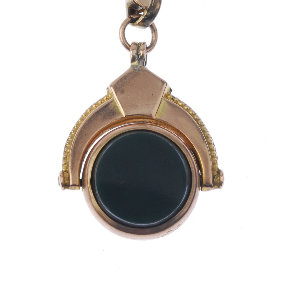 A late 19th century 9ct gold Albert and hardstone swivel fob. The fancy-link Albert chain, - Image 2 of 4