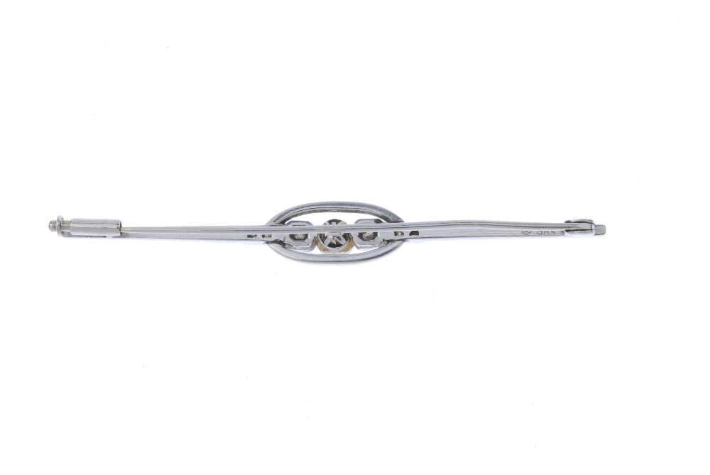 A cultured pearl and diamond bar brooch. The cultured pearl, and brilliant and single-cut diamond - Image 2 of 2