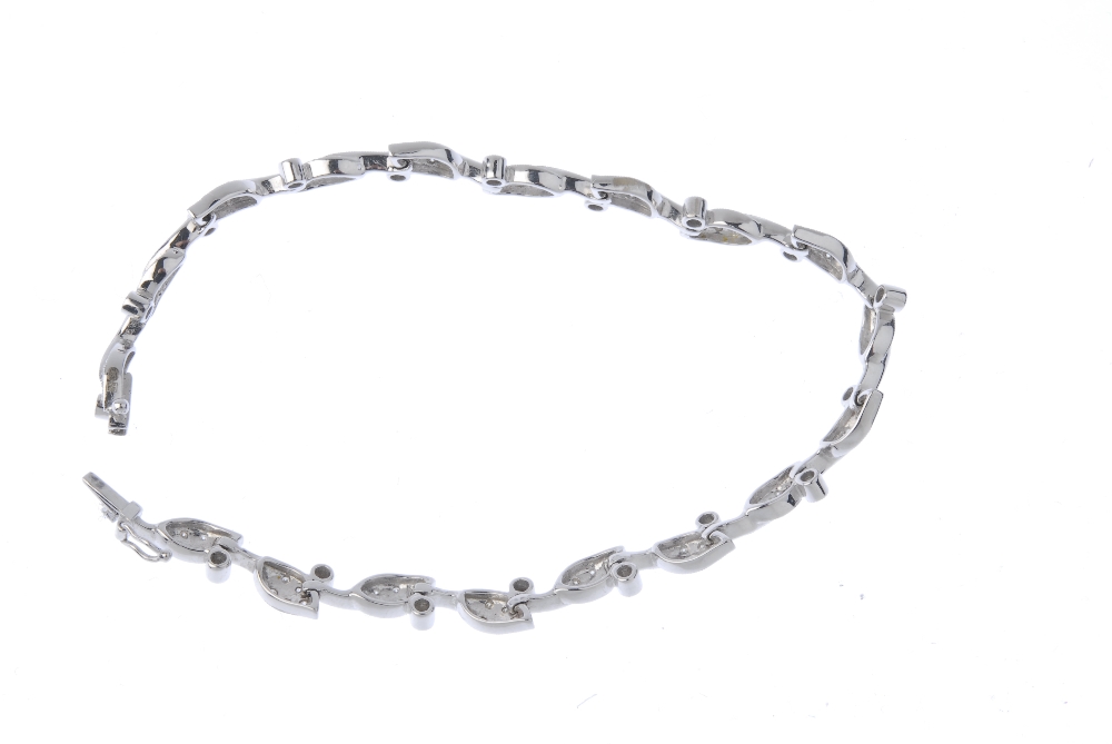 A diamond foliate bracelet. Comprising a series of brilliant-cut diamond leaf links, with - Image 3 of 3