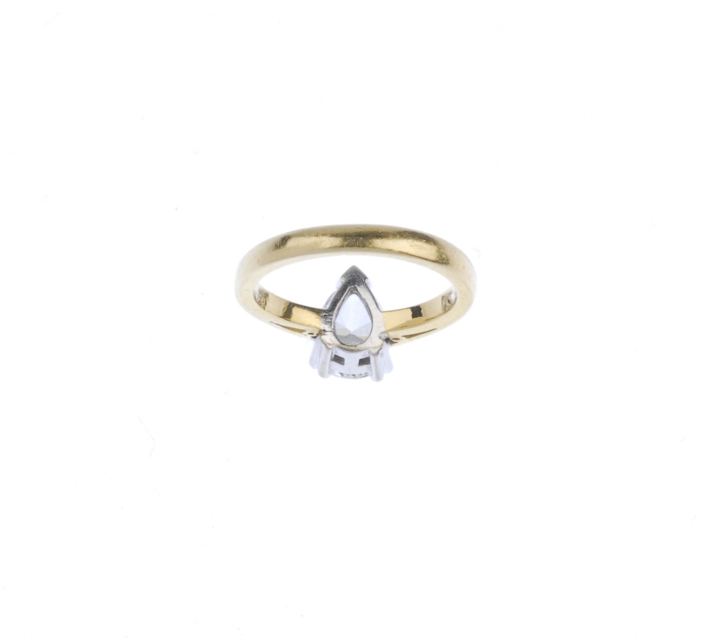 (546230-2-A) An 18ct gold diamond single-stone ring. The pear-shape diamond, to the bi-colour - Image 2 of 3