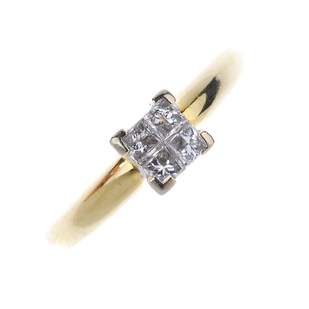 An 18ct gold diamond four-stone ring. The four square-shape diamonds, to the tapered band. Estimated