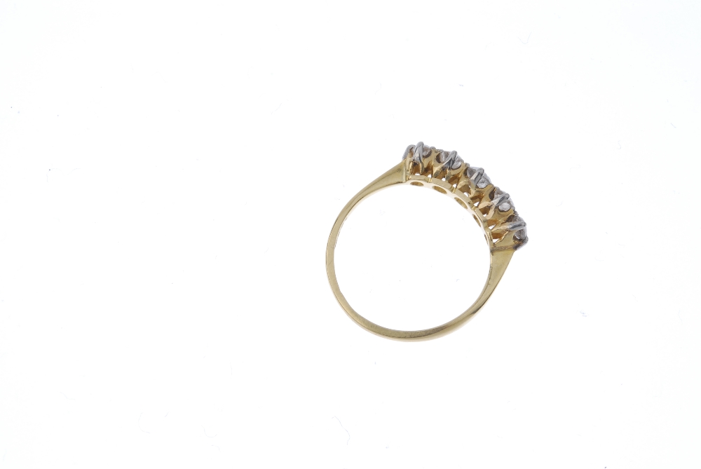 A mid 20th century 18ct gold diamond five-stone ring. The slightly graduated old-cut diamond line, - Image 4 of 4