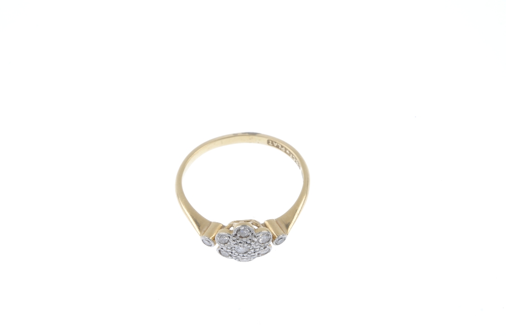 A mid 20th century platinum and 18ct gold diamond cluster ring. The single-cut diamond floral - Image 2 of 4