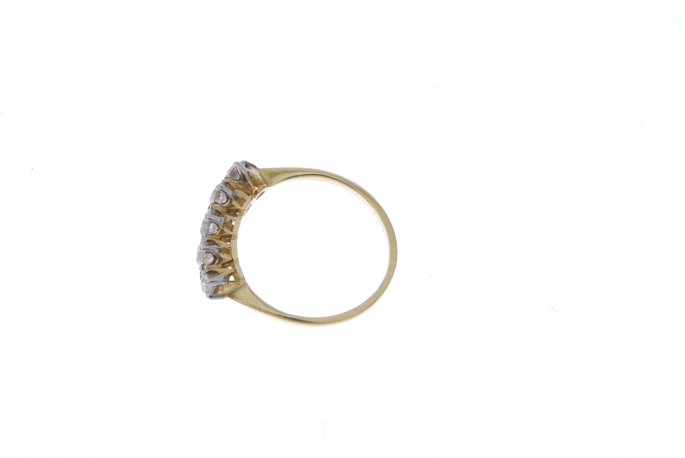 A mid 20th century 18ct gold diamond five-stone ring. The slightly graduated old-cut diamond line, - Image 3 of 4