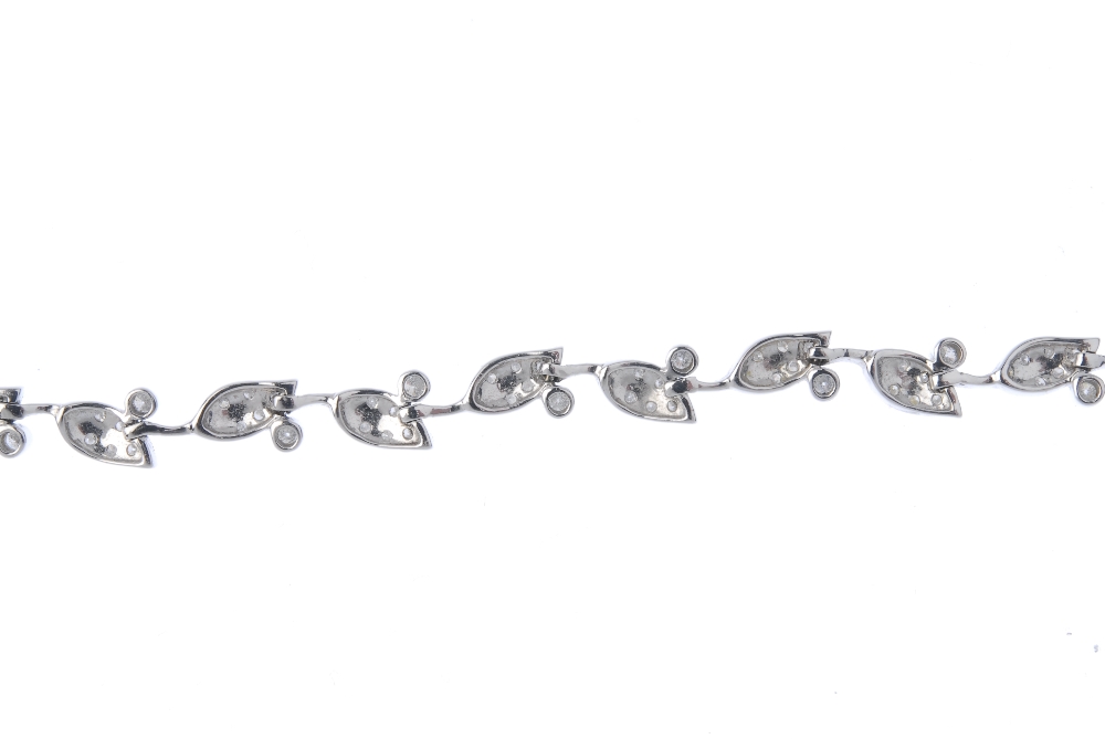 A diamond foliate bracelet. Comprising a series of brilliant-cut diamond leaf links, with - Image 2 of 3