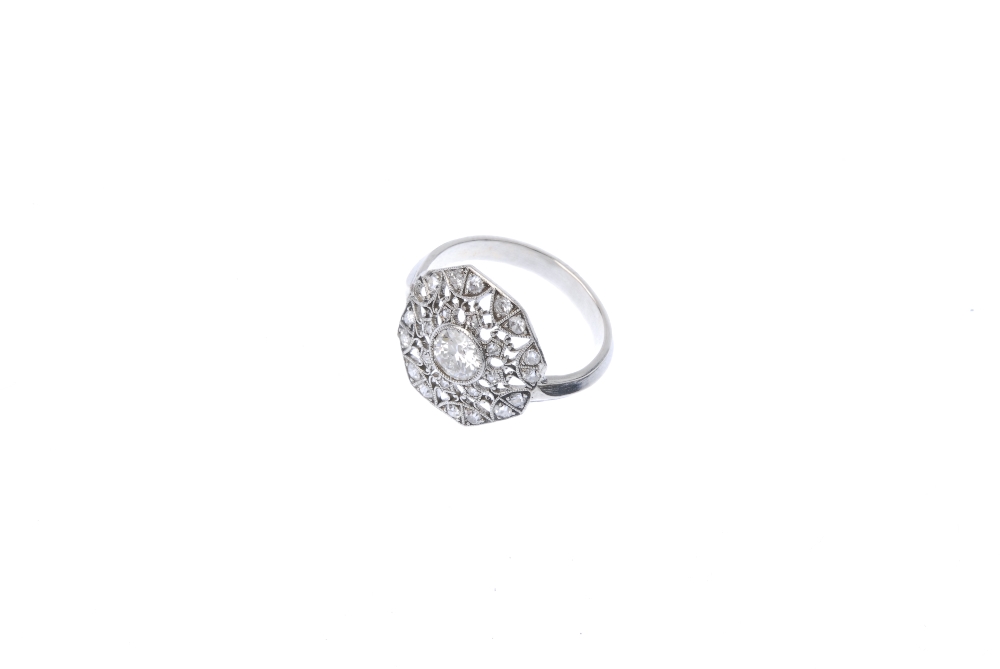 A diamond cluster ring. Of openwork design, the brilliant-cut diamond collet, within a single-cut - Image 2 of 4