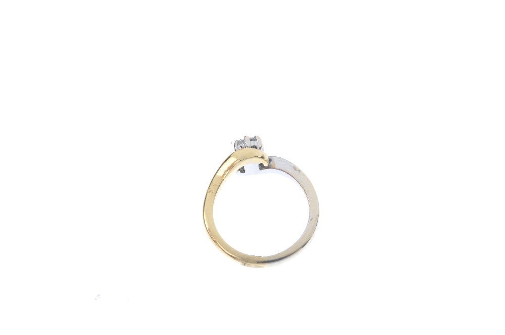 An 18ct gold diamond crossover ring. Of bi-colour design, the brilliant-cut diamond, to the - Image 4 of 4