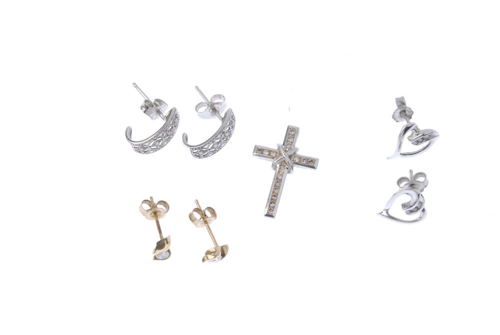 A selection of diamond jewellery. To include a diamond cross, a pair of 9ct gold diamond ear - Image 3 of 3