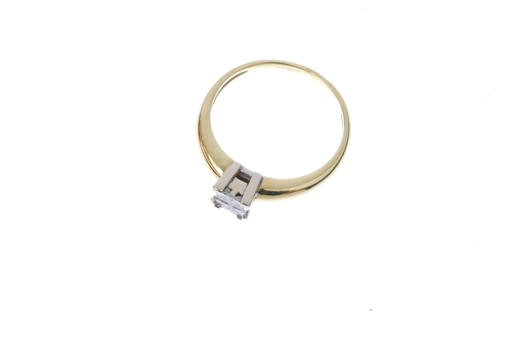 An 18ct gold diamond four-stone ring. The four square-shape diamonds, to the tapered band. Estimated - Image 2 of 4