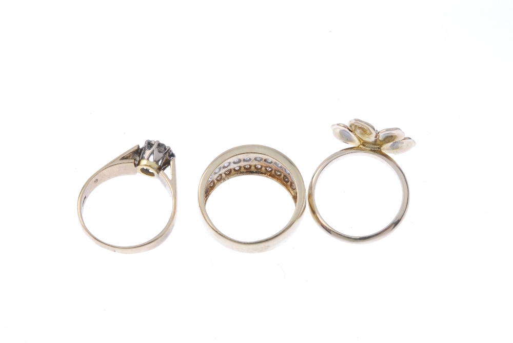 A selection of three 9ct gold diamond rings. To include a brilliant-cut diamond floral dress ring, a - Image 3 of 3