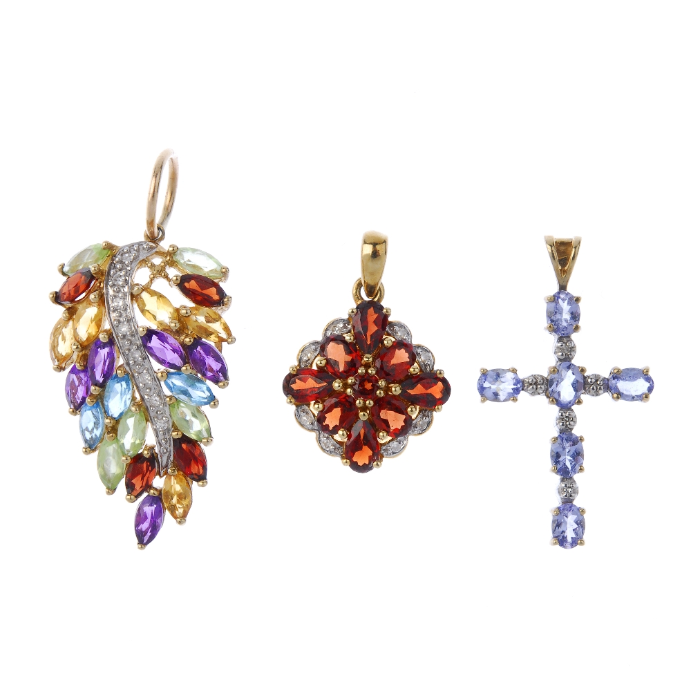 A selection of diamond and gem-set pendants. To include a vari-shape garnet and diamond cluster