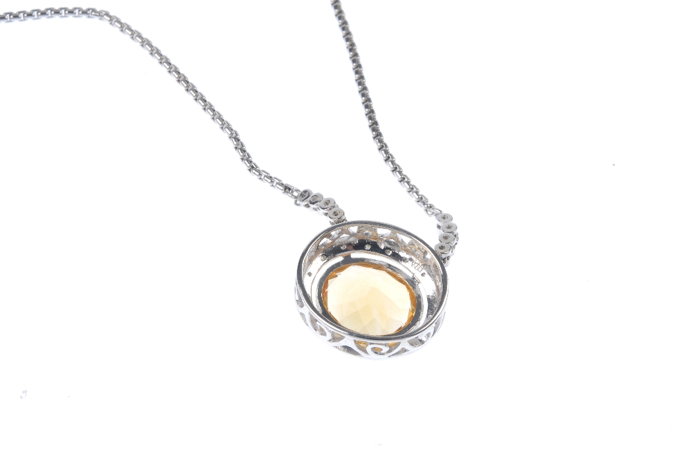 An 18ct gold citrine and diamond cluster necklace. The oval-shape citrine collet, within a single- - Image 2 of 3
