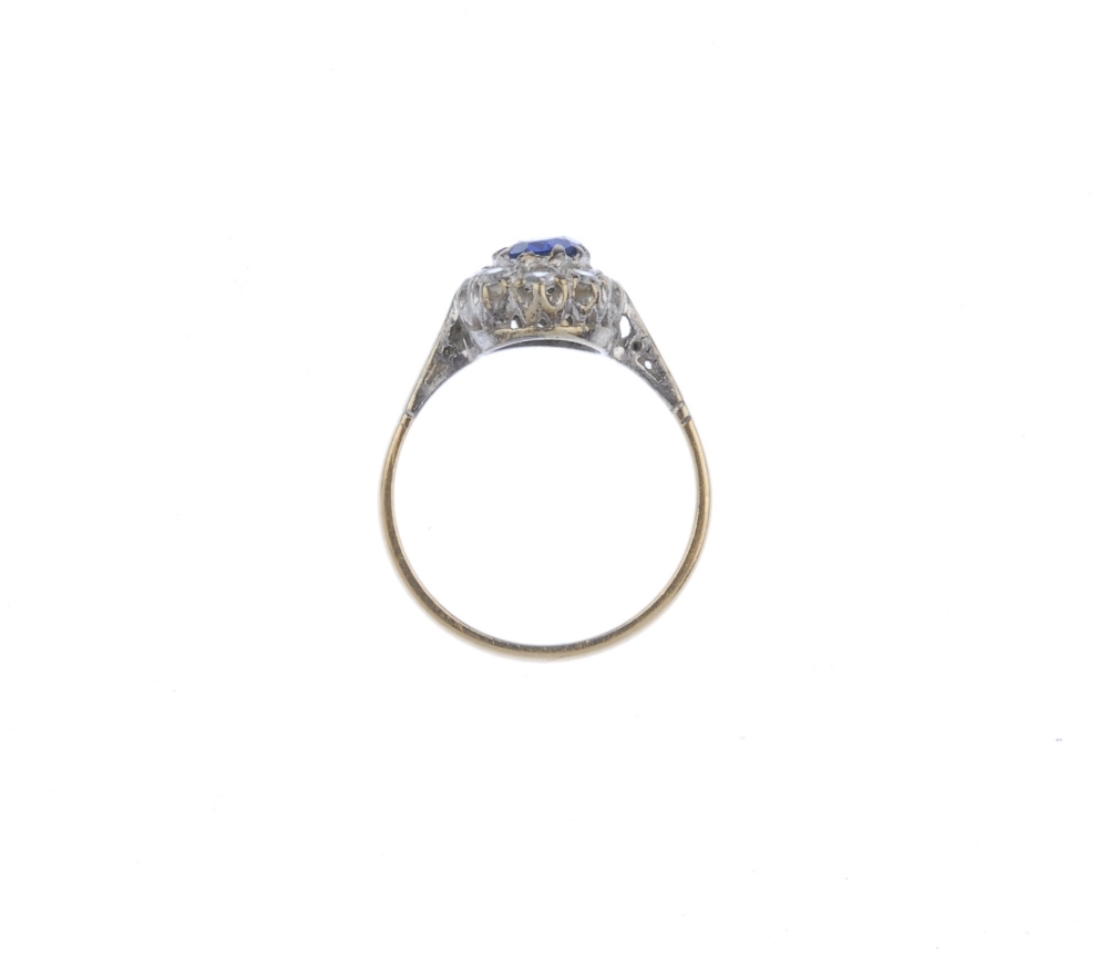 (539672-1-A) Two 9ct gold gem-set rings. To include a sapphire and colourless paste three-stone - Image 2 of 4