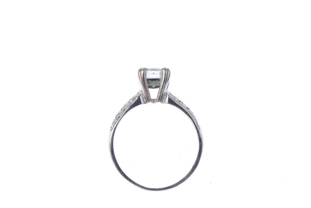 An 18ct gold moissanite single-stone ring. The circular-shape moissonite, to the pave-set - Image 4 of 4
