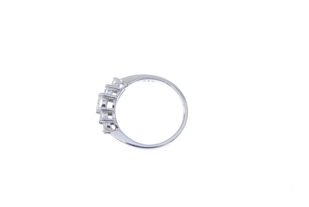 A diamond five-stone ring. The graduated brilliant-cut diamond stepped line, to the tapered - Image 3 of 4