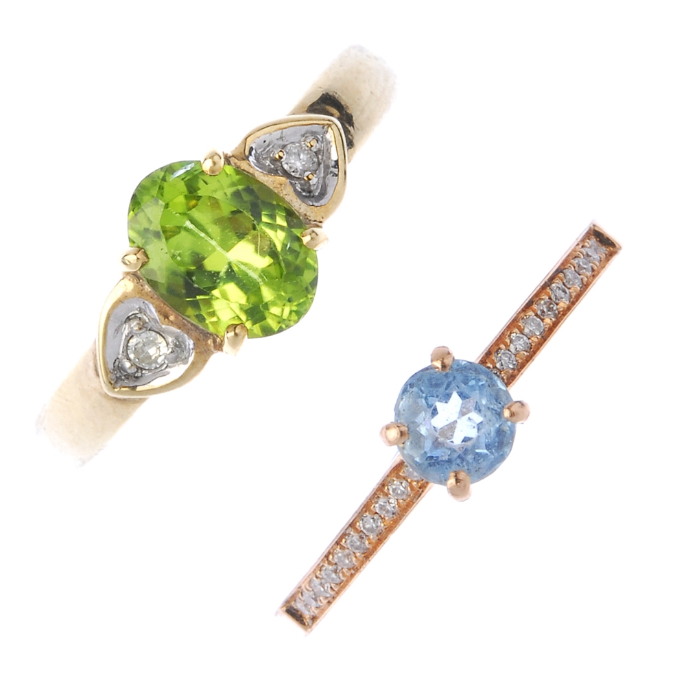 A selection of four gold diamond and gem-set rings. To include a circular-shape blue topaz and