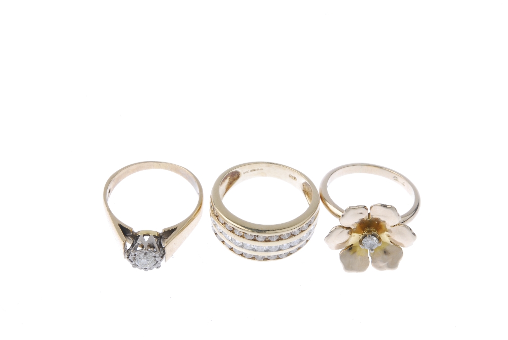 A selection of three 9ct gold diamond rings. To include a brilliant-cut diamond floral dress ring, a - Image 2 of 3