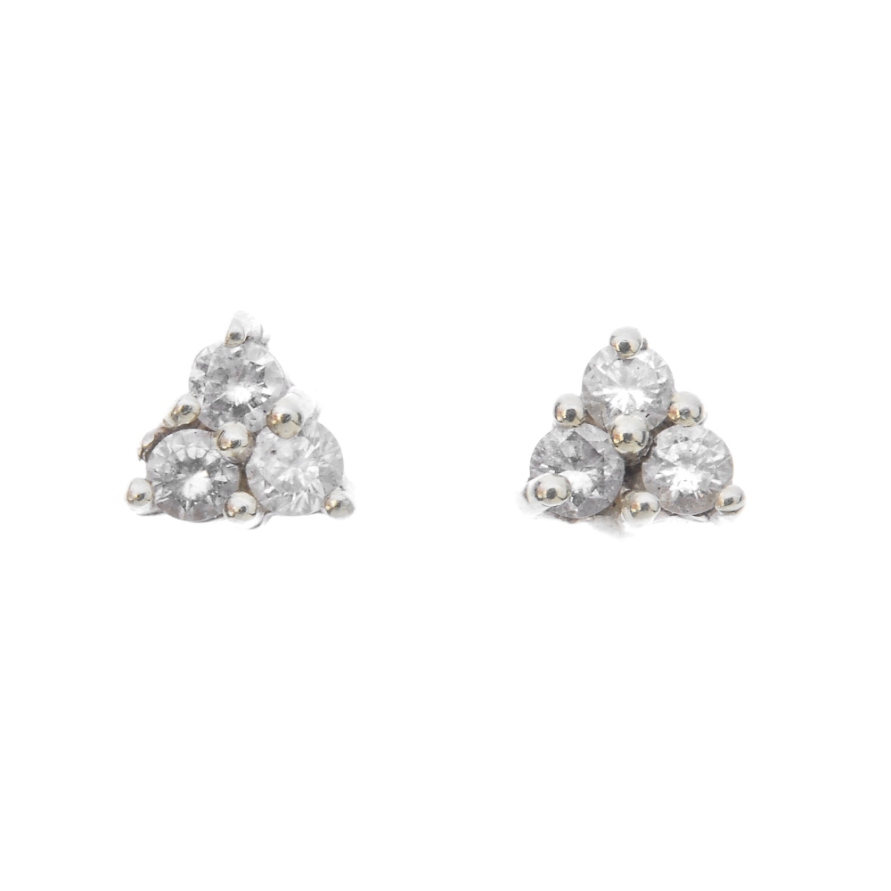 Two pairs of 18ct gold diamond ear studs and a diamond pendant. To include a pair of 18ct gold