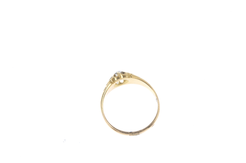 An 18ct gold diamond single-stone ring. The old-cut diamond, to the scrolling sides and - Image 4 of 4