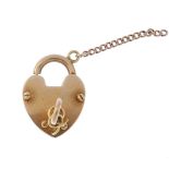 A late Victorian 15ct gold padlock clasp, circa 1890. The heart-shape padlock, with working key.