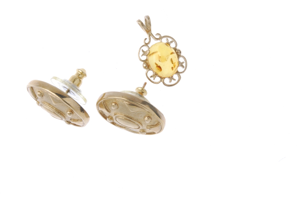 A pair of 9ct gold earrings and two pendants. The pair of earrings each designed as an oval-shape - Image 3 of 3