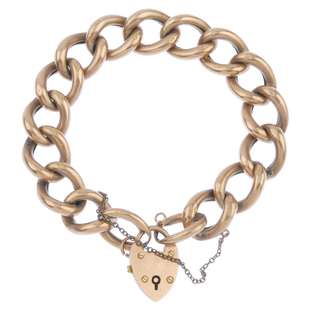 A late 19th century 9ct gold curb-link bracelet. Designed as a series of curb links, to the