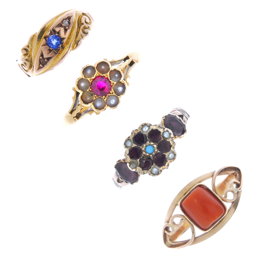 A selection of four gem-set rings. To include a mid 19th century garnet, split pearl and turquoise