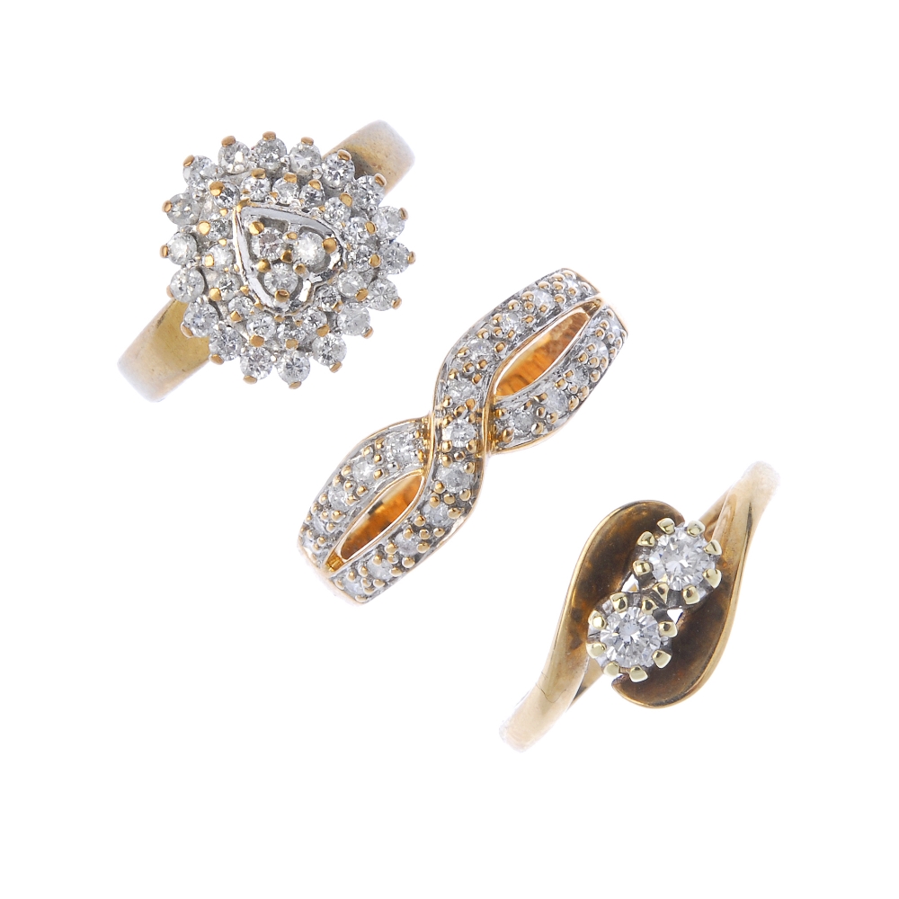 A selection of three 9ct gold diamond rings. To include a brilliant-cut diamond two-stone