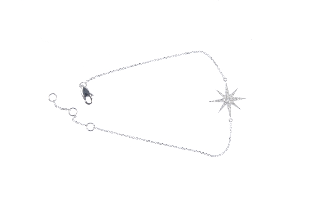 * A diamond star bracelet. The brilliant-cut diamond star, to the fine belcher-link chain. Total - Image 3 of 3