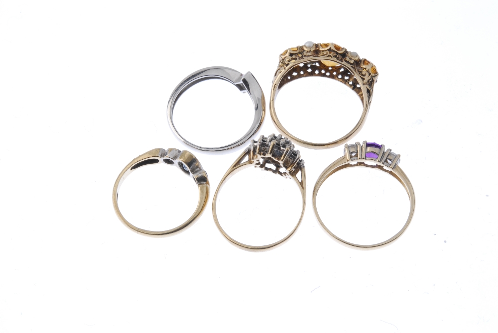 A selection of five 9ct gold gem-set rings. To include a sapphire and cubic zirconia cluster ring, a - Image 3 of 3