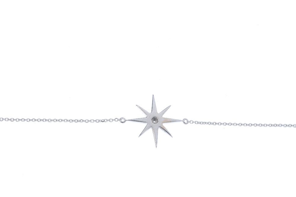 * A diamond star bracelet. The brilliant-cut diamond star, to the fine belcher-link chain. Total - Image 2 of 3