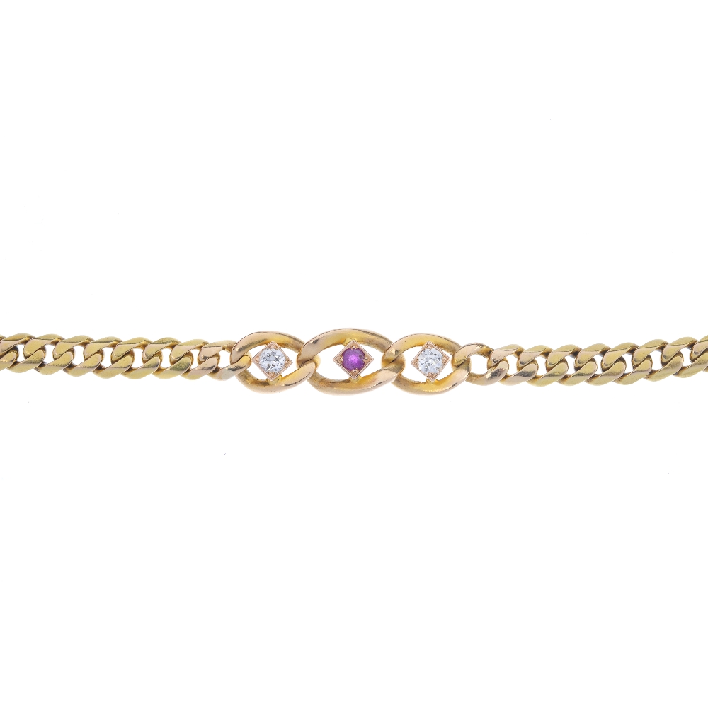 A ruby and diamond bracelet. The circular-shape ruby and old-cut diamonds, each within a curb