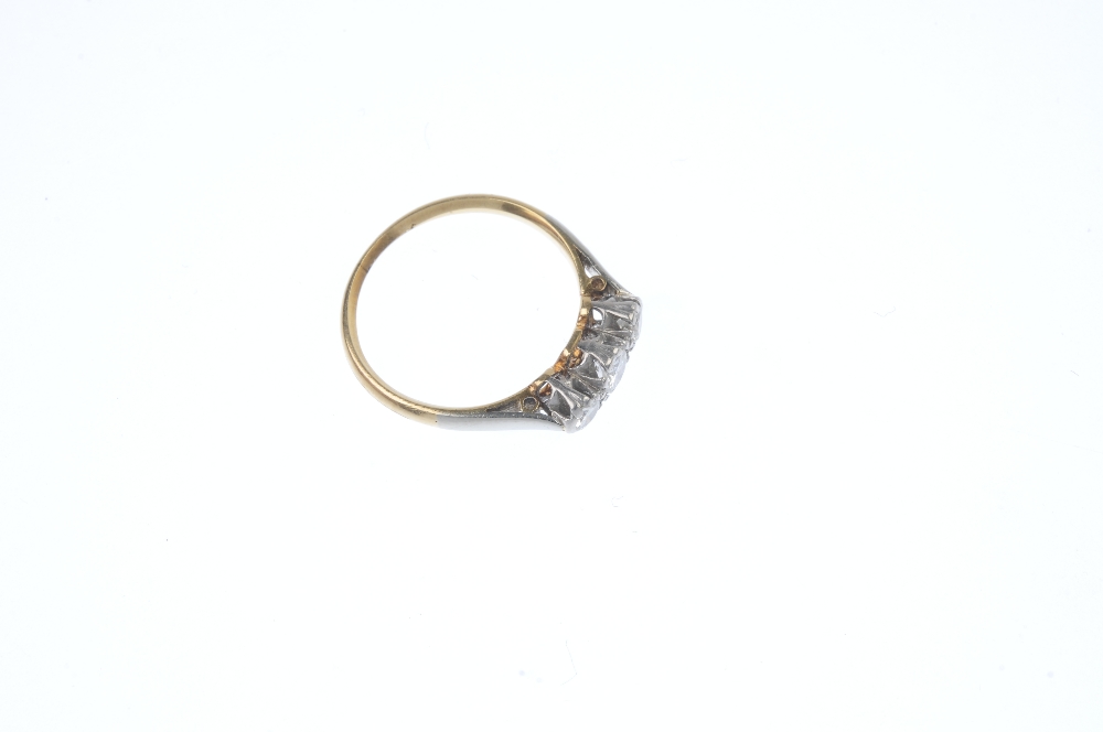 A mid 20th century gold and platinum diamond three-stone ring. The brilliant-cut diamonds, to the - Image 3 of 4