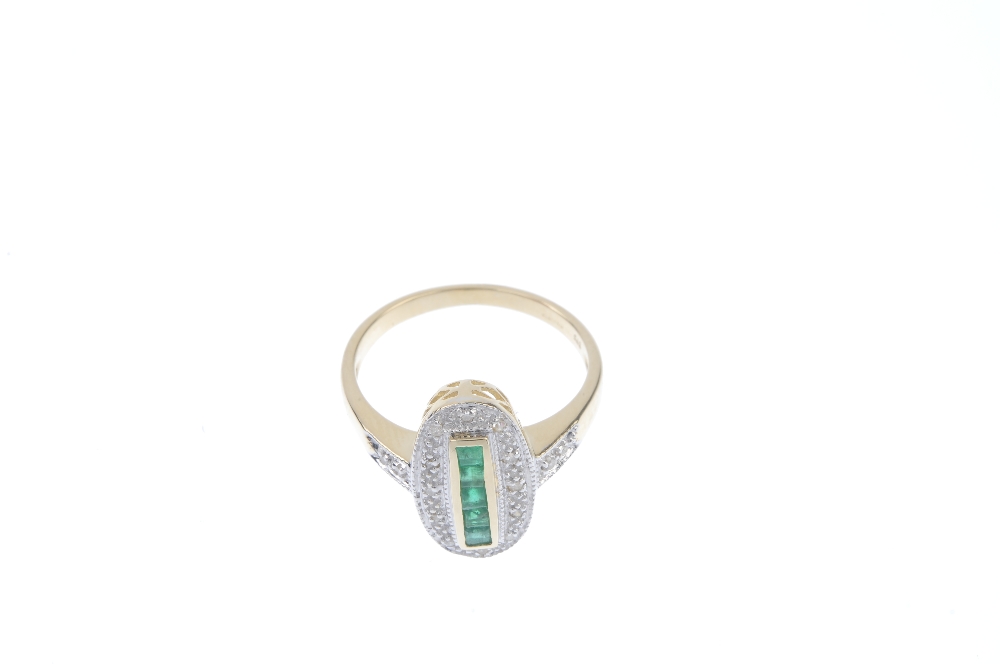 A 9ct gold emerald and diamond dress ring. The square-shape emerald line, within a single-cut - Image 2 of 4