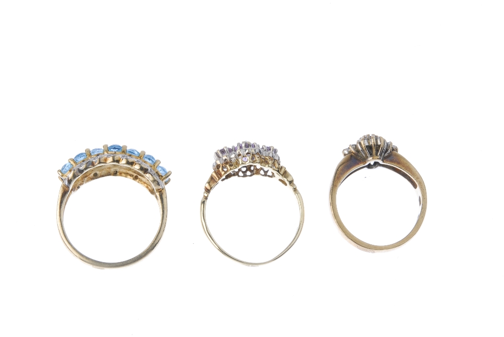 Three 9ct gold gem-set and diamond rings. To include a 9ct gold blue topaz and diamond point dress - Image 4 of 4