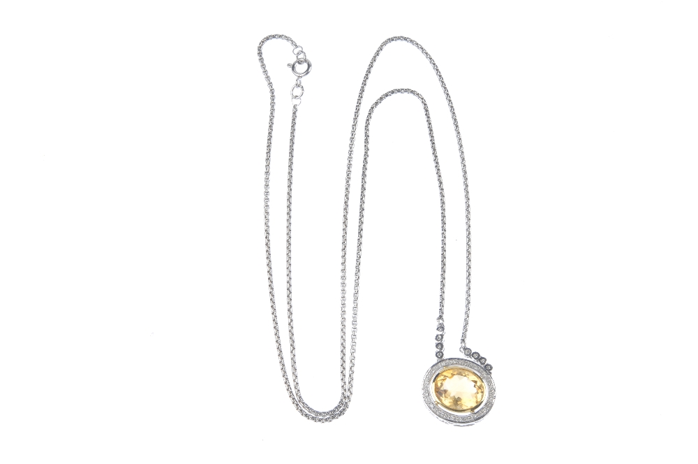 An 18ct gold citrine and diamond cluster necklace. The oval-shape citrine collet, within a single- - Image 3 of 3